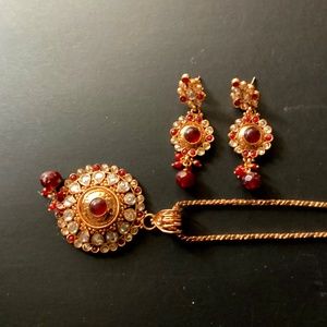 Gold and red necklace with earring set